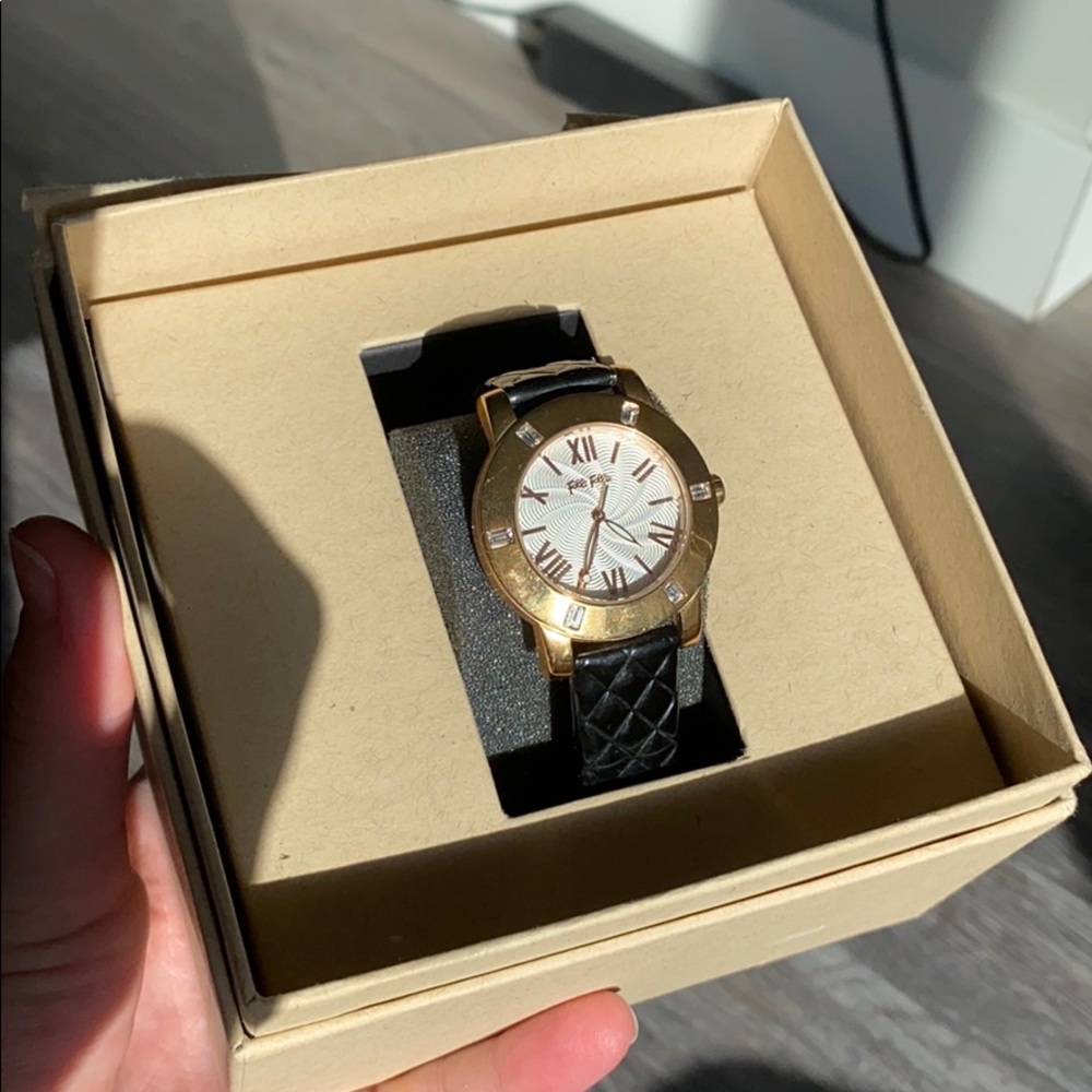 Beautiful gold watch with crystal details